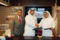 Al Hokair and Asmael shake hands<br> on the deal